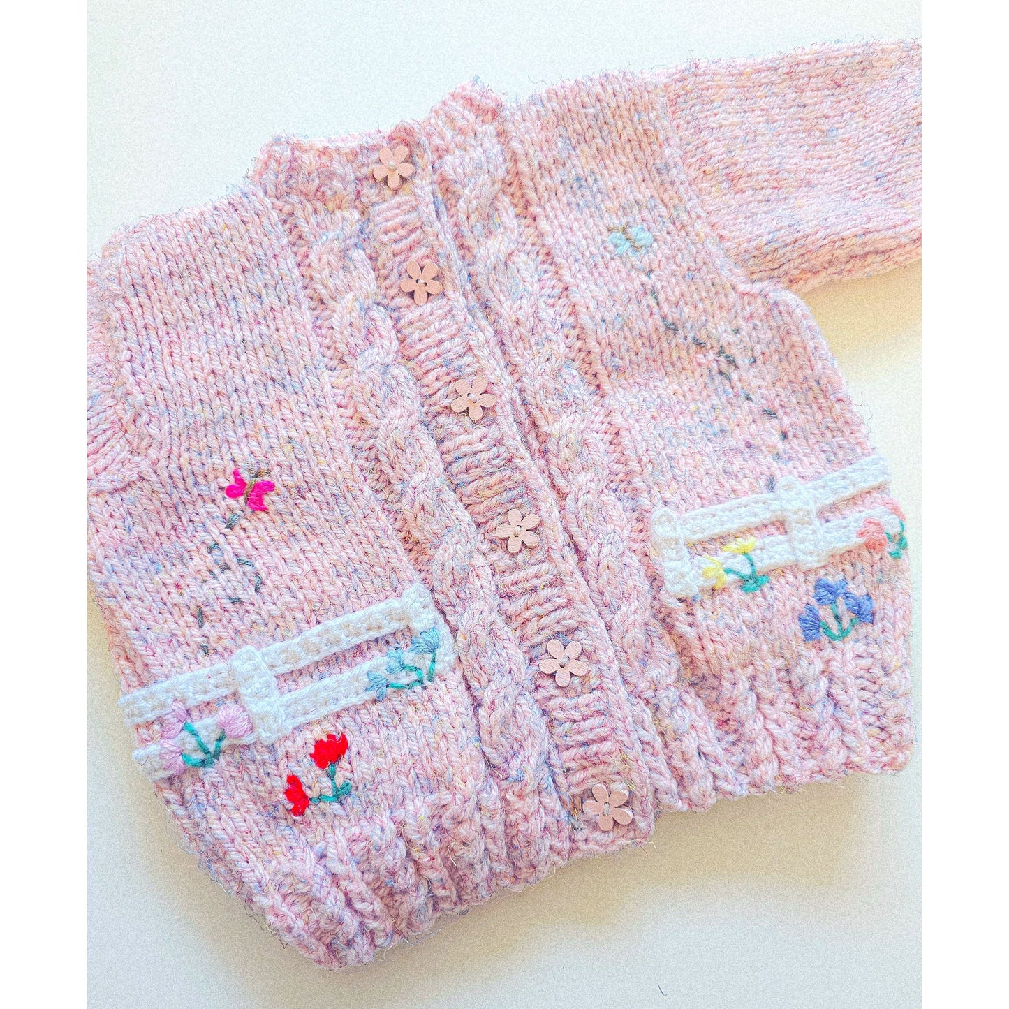 Welcome to the fairy garden!
Hand-knitted Cardigan (Age 6–9 months)